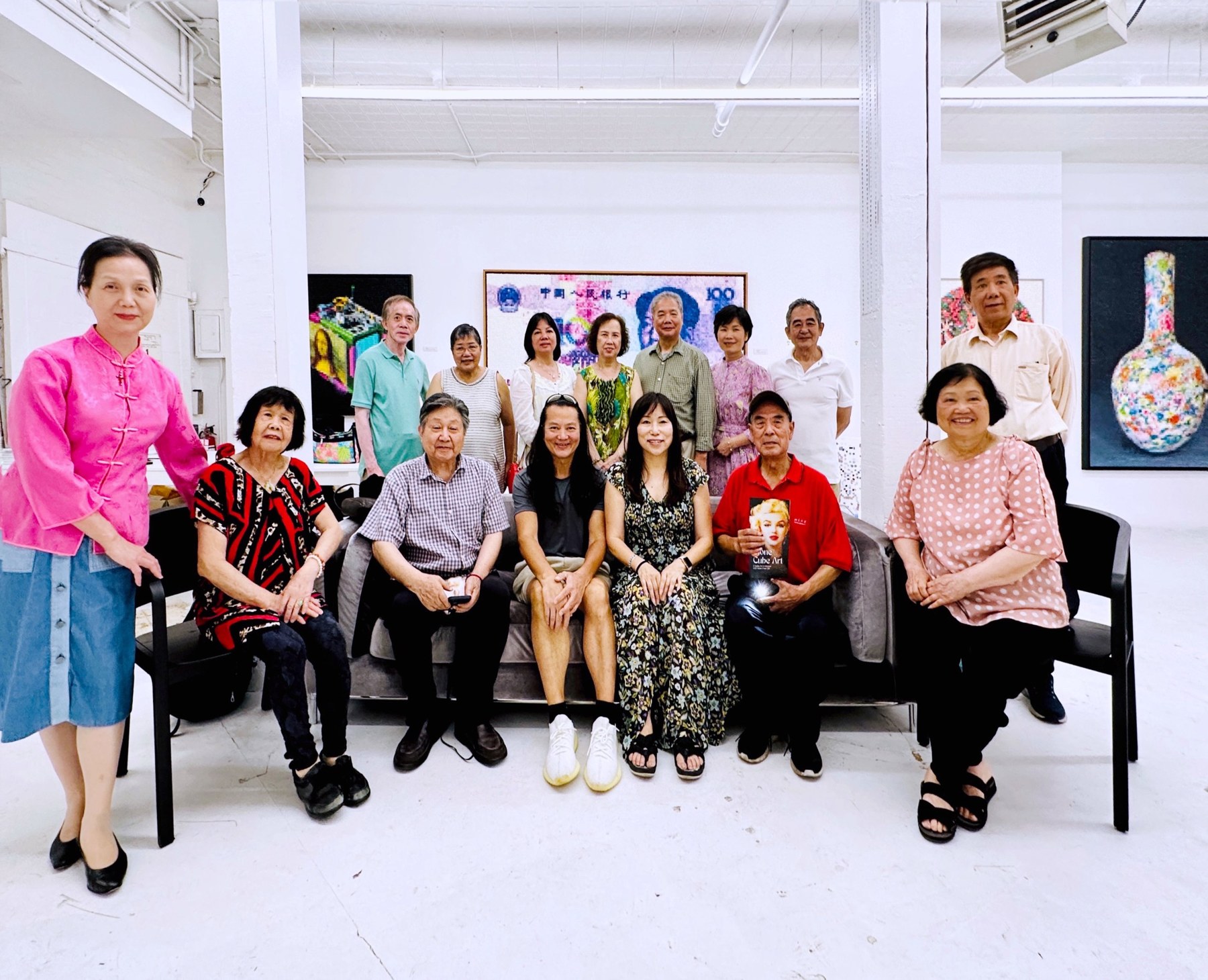 Visitors and artworks at Stone Chun Shi’s exhibition